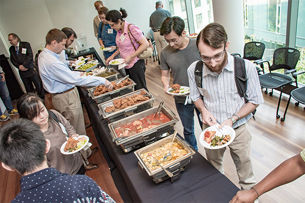 Participants going through buffet line